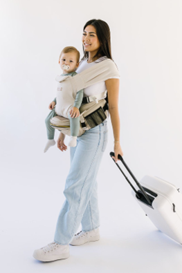 traveling with baby for christmas and thanksgiving using tushbaby hip carrier