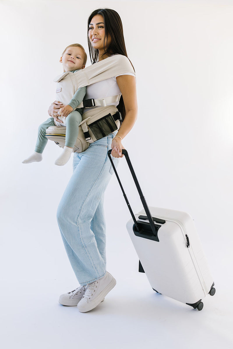 essential tushbaby products to use while flying with a baby