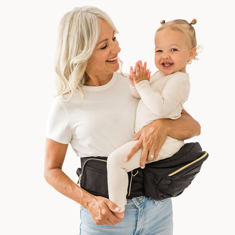 Women using tushbaby::[15109665521730]