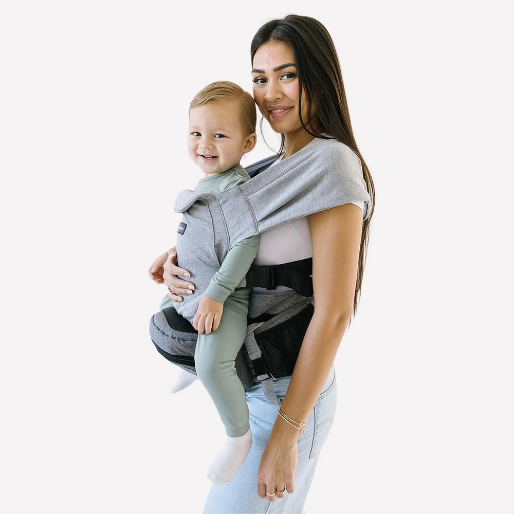 Women holding baby using tushbaby gray ::[15109665390658]