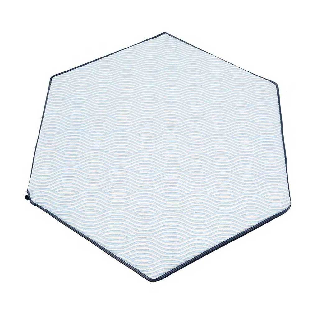 Pop 'N Go® Playpen Mattress with Whimsical Waves cover, hexagon shape with white and light blue wave pattern and navy trim, top view