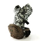 Abstract Hip Seat Hands-Free Attachment connected to a Cheetah Tushbaby Hip Carrier on a white background
