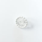 Front view of a White Orthodontic Pacifier with a beaded teether ring on a white background